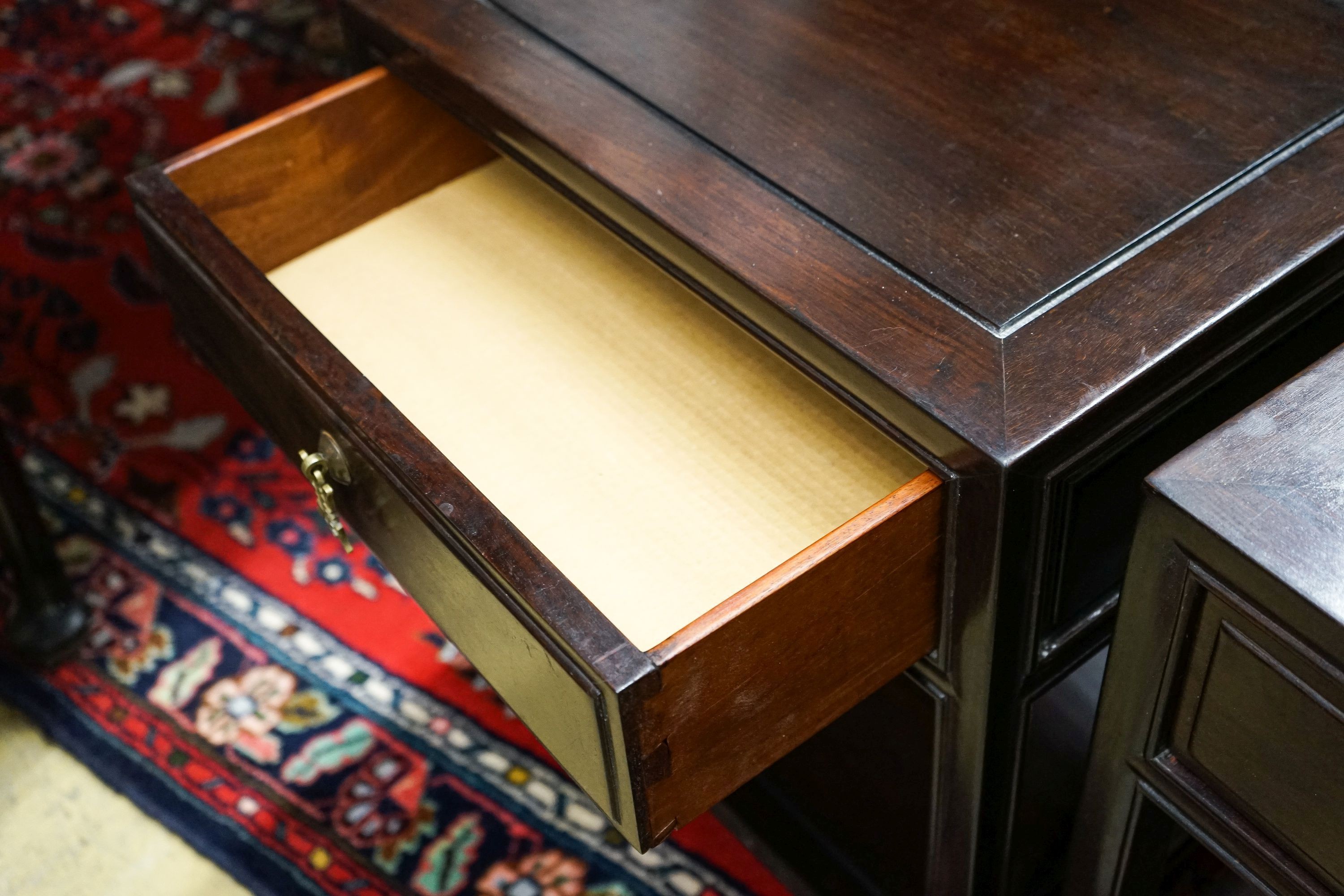 A pair of Chinese hardwood bedside tables, width 46cm, depth 38cm, height 51cm